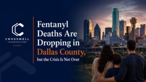Dallas family overlooking the Dallas skyline representing fentanyl awareness and intervention services in Dallas County.