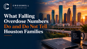 Crosswell Interventions branded featured image with Houston skyline and the headline “What Falling Overdose Numbers Do and Do Not Tell Houston Families.